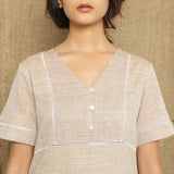 Front Detail of a Model wearing Handspun Cotton Lace Yoked Dress