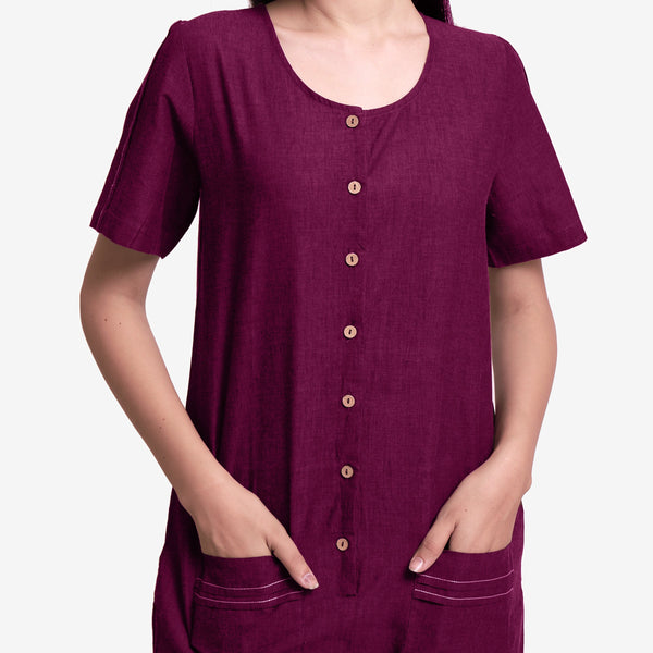 Front Detail of a Model wearing Handspun Cotton Mulberry Button-Down Romper