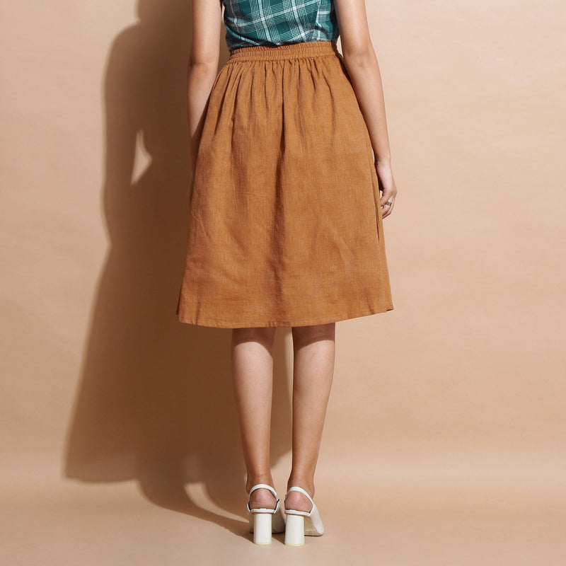 Back View of a Model wearing Handspun Cotton Muslin Flared Skirt