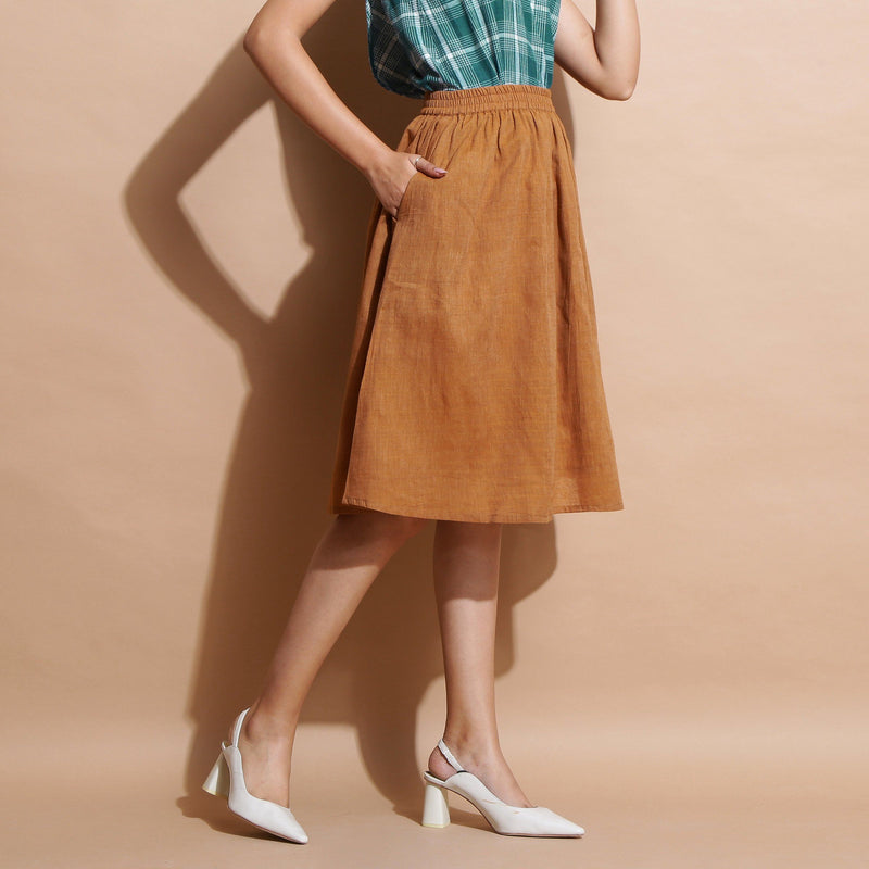 Right View of a Model wearing Handspun Cotton Muslin Flared Skirt