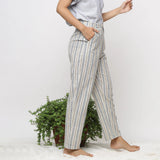 Right View of a Model wearing Handspun Cotton Striped Tapered Pant