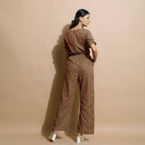 Back View of a Model wearing Handspun Frilled Sleeve Straight Jumpsuit