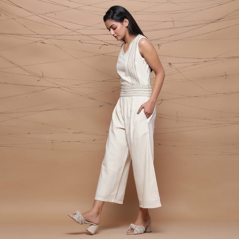 Left View of a Model wearing Handspun Ivory Jute Laced Jumpsuit