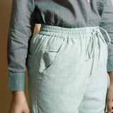 Front Detail of a Model wearing Light Green Checkered Cotton Muslin Elasticated Mid-Rise Pant