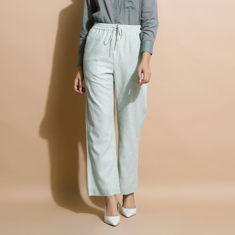 Front View of a Model wearing Light Green Checkered Cotton Muslin Elasticated Mid-Rise Pant