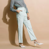 Right View of a Model wearing Light Green Checkered Cotton Muslin Elasticated Mid-Rise Pant