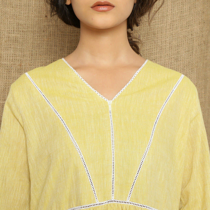Front Detail of a Model wearing Handspun Light Yellow Gathered Dress