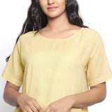 Front Detail of a Model wearing Handspun Light Yellow Loose Fit Top