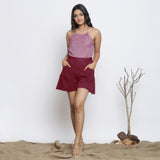 Front View of a Model wearing Handspun Maroon Flared Shorts