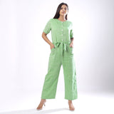 Front View of a Model wearing Handspun Mint Green Paneled Button-Down Jumpsuit