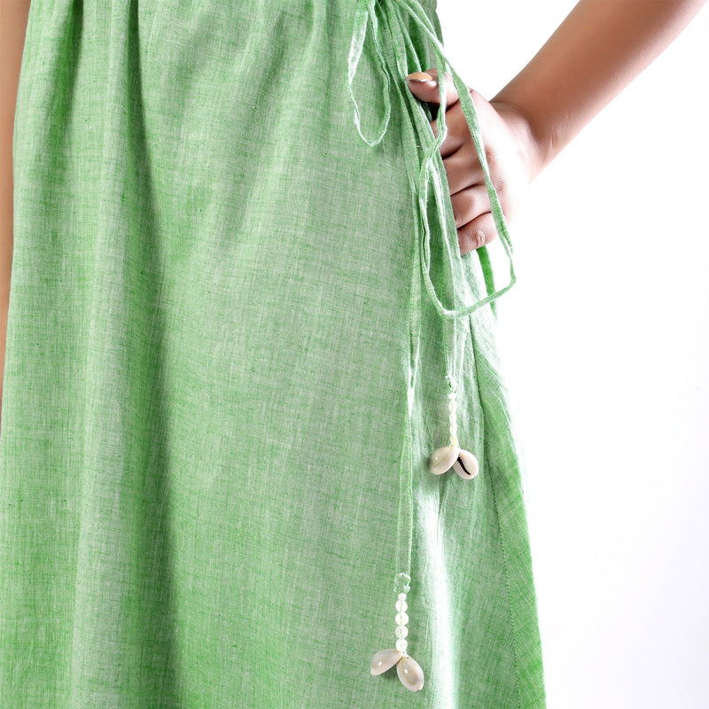 Close Detail of a Model wearing Handspun Mint Green Strappy Circular Dress