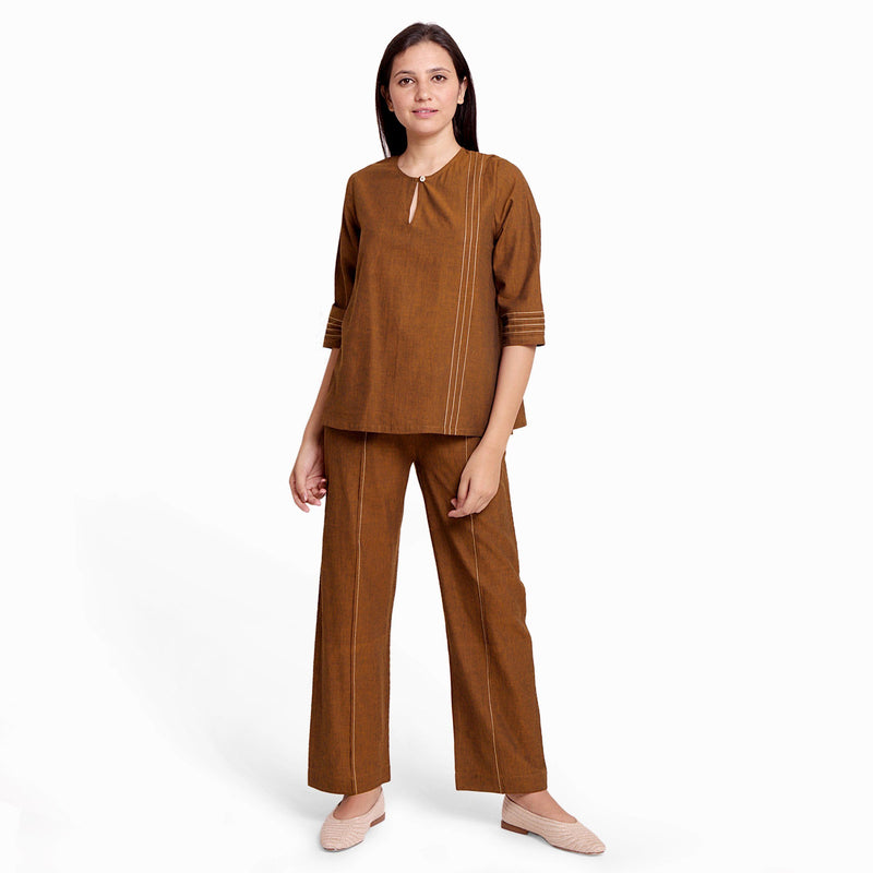 Front View of a Model wearing Handspun Oak Brown Cotton Straight Top