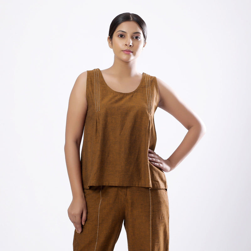 Front View of a Model wearing Handspun Oak Brown Straight Cotton Top