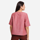 Back View of a Model wearing Handspun Red A-Line Button-Down Top