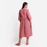Back View of a Model wearing Handspun Solid Red Tie-Up Cotton Wrap Dress