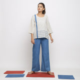 Front View of a Model wearing White and Blue Vegetable Dyed Handspun Cotton Paneled Top