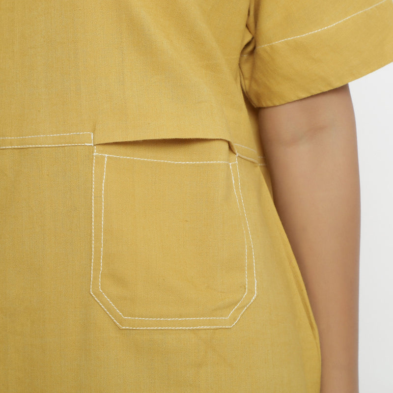 Front Detail of a Model wearing Lemon Yellow Vegetable Dyed Handspun Cotton Knee Length Yoked Dress