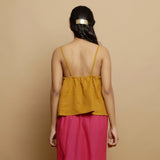 Back View of a Model wearing Handwoven Cotton Flared Godet Top