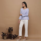 Front View of a Model wearing Handwoven Cotton Top and Off-White Pant Set