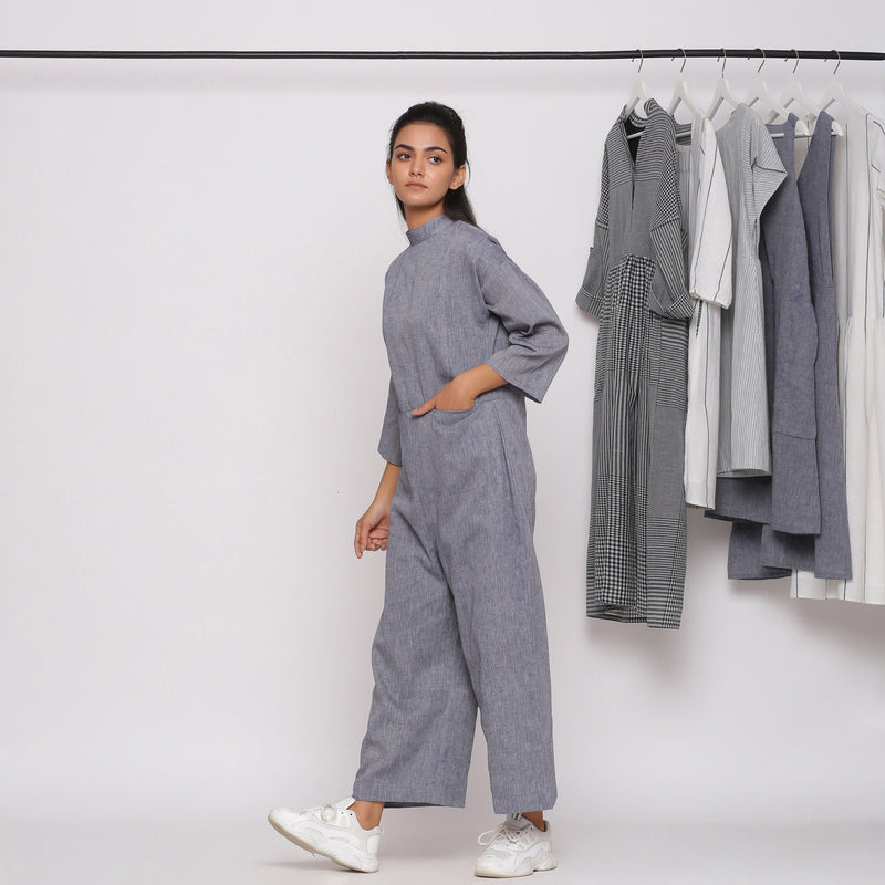 Left View of a Model wearing Handspun Charcoal Grey Straight Jumpsuit
