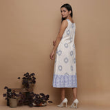 Left View of a Model wearing Ikat Off-White Cotton Shift Dress