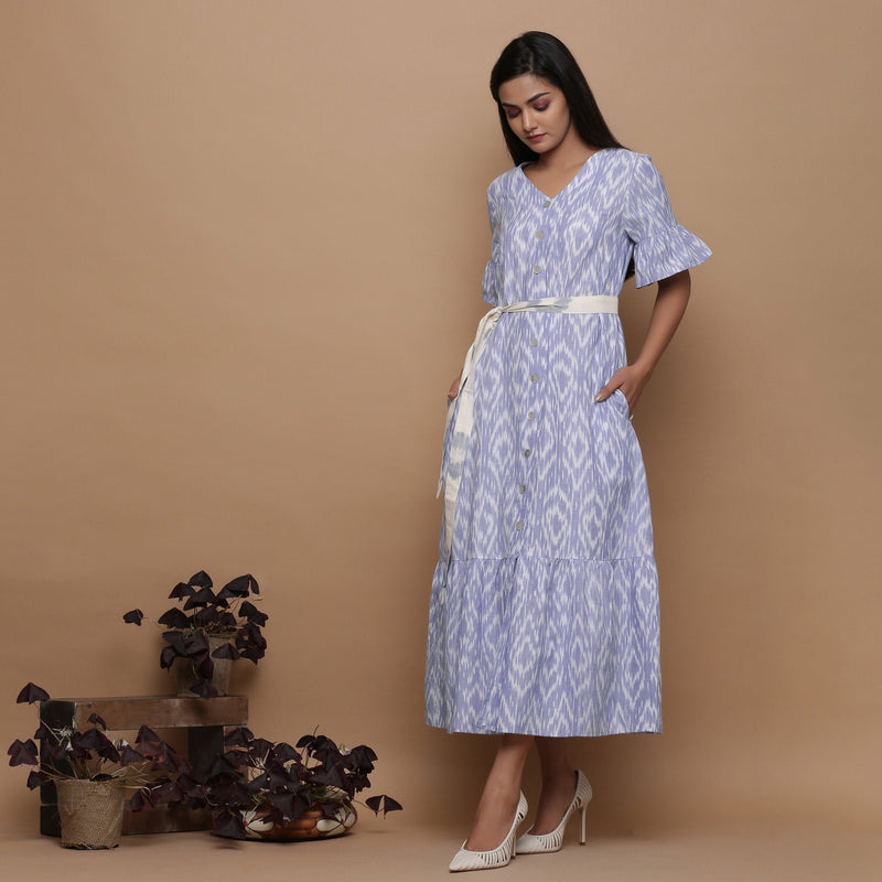 Left View of a Model wearing Blue Handwoven Cotton Button-Down Dress