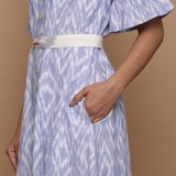 Front Detail of a Model wearing Blue Handwoven Cotton Button-Down Dress