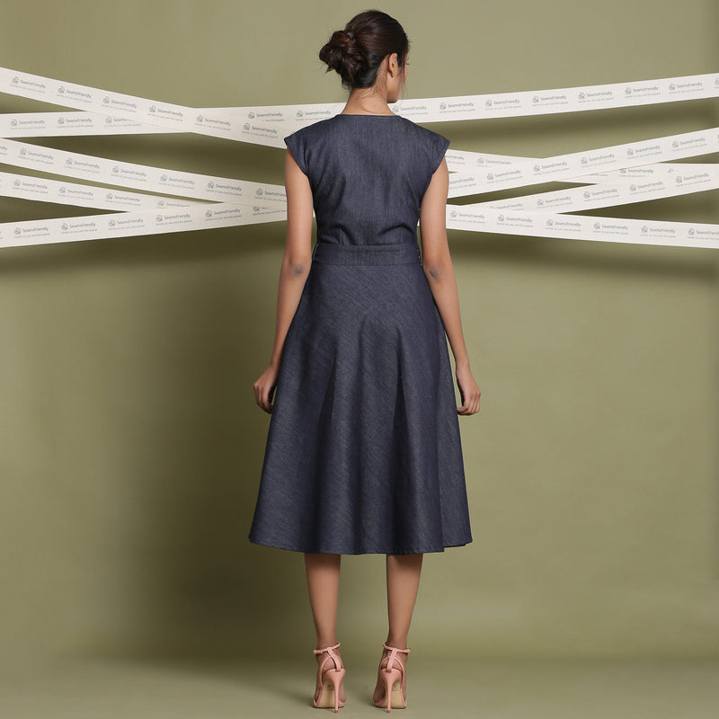 Back View of a Model wearing Indigo Cotton Denim V-Neck Fit and Flare Midi Dress