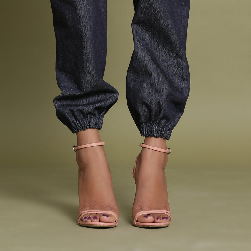 Close View of a Model wearing Indigo Cotton Denim Elasticated Mid-Rise Jogger Pant