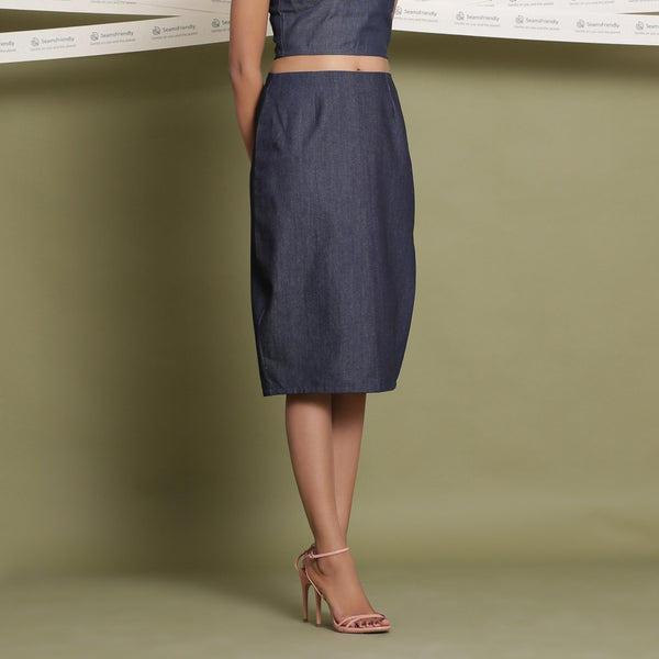 Right View of a Model wearing Indigo Cotton Denim Slit Pencil Skirt