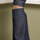 Left Detail of a Model wearing Indigo Cotton Denim Slit Pencil Skirt