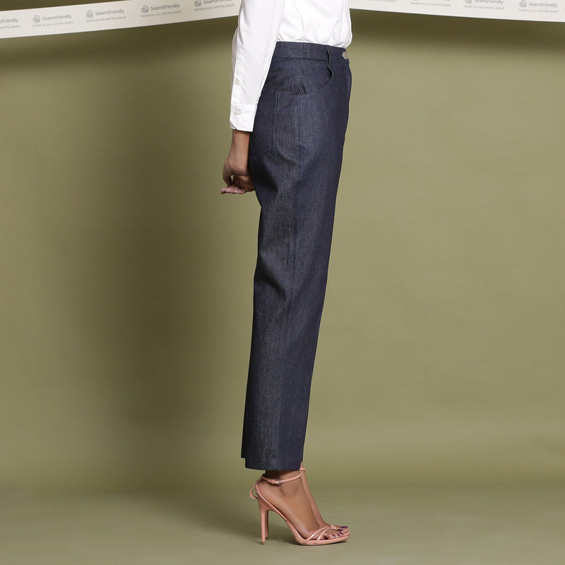 Right View of a Model wearing Indigo Cotton Denim Tapered Pant