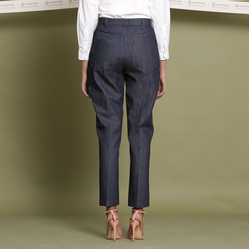 Back View of a Model wearing Indigo Cotton Denim Tapered Pant