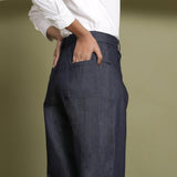 Back Detail View of a Model wearing Indigo Cotton Denim Wide Legged Jeans