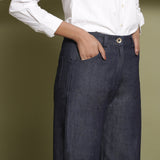 Front Detail of a Model wearing Indigo Cotton Denim Wide Legged Jeans