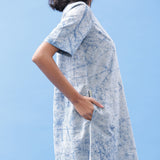 Right Detail of a Model wearing Blue Dabu Hand Lep Print Cotton Knee Length Dress