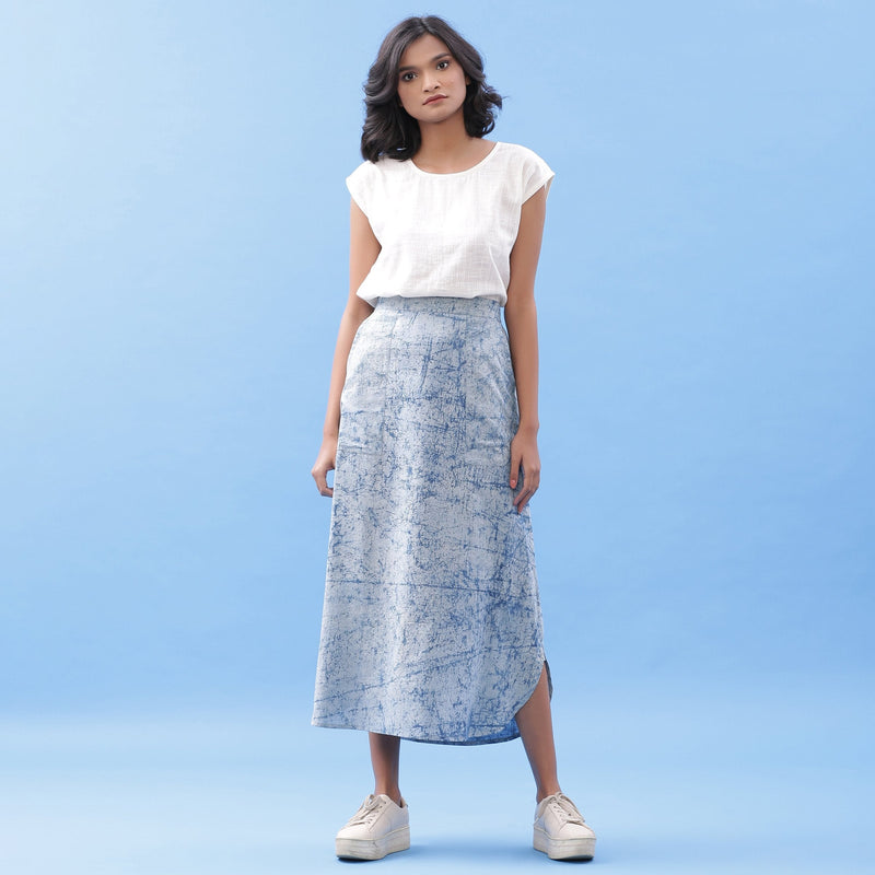 Front View of a Model wearing Indigo Dabu Printed Cotton Elasticated A-Line Maxi Skirt