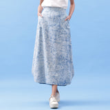 Front View of a Model wearing Indigo Dabu Printed Cotton Elasticated A-Line Maxi Skirt
