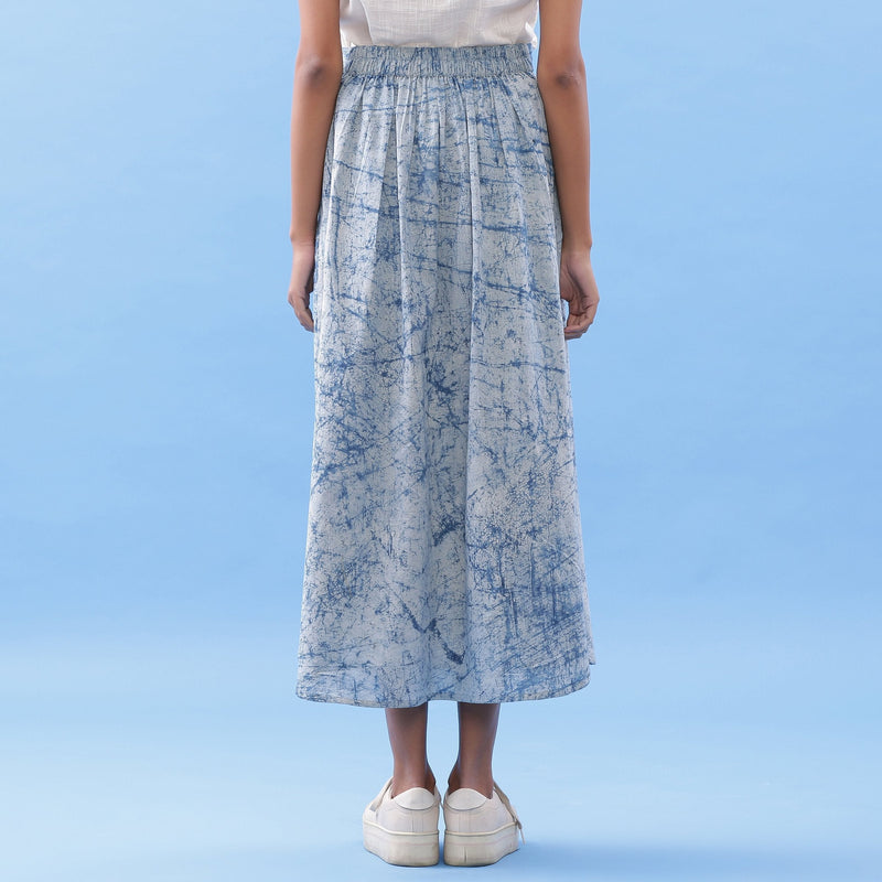Back View of a Model wearing Indigo Dabu Printed Cotton Elasticated A-Line Maxi Skirt