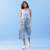 Front View of a Model wearing Indigo Dabu Printed Button-Down Jumpsuit