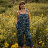 Front View of a Model wearing Indigo Flared Midi Floral Jumpsuit