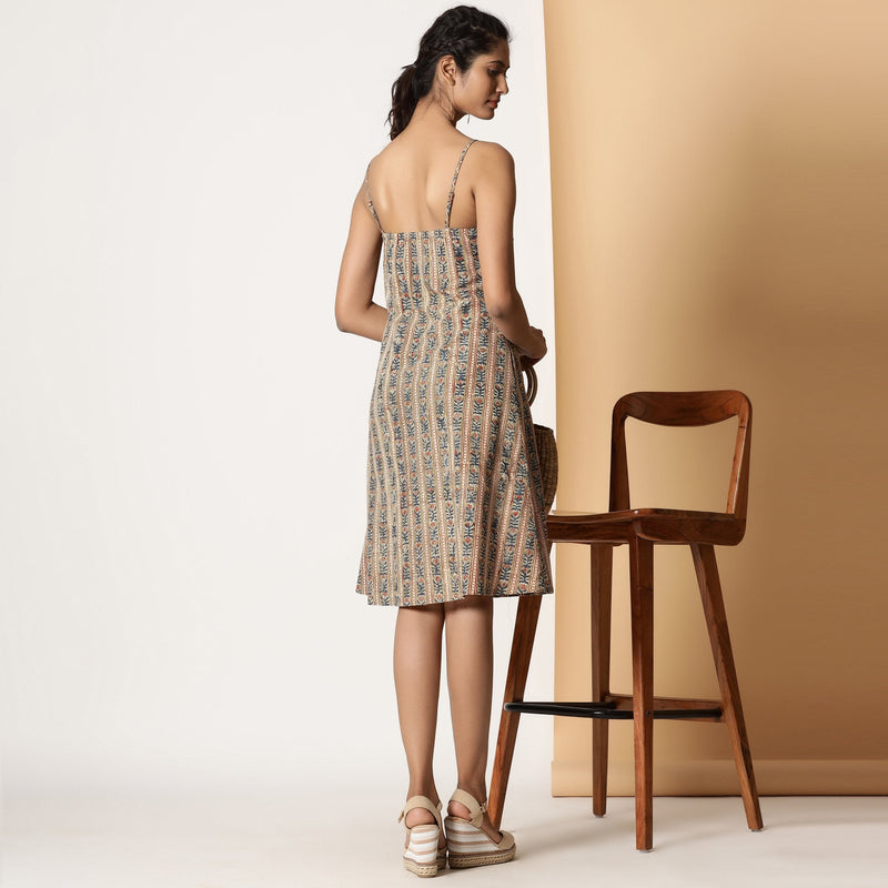 Back View of a Model wearing Kalamkari Block Printed Cotton Knee Length Slit Dress