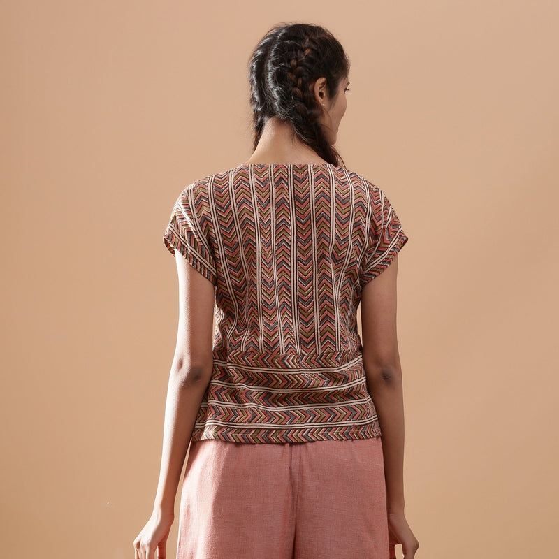 Back View of a Model wearing Kalamkari Cotton Chevron Yoked Top