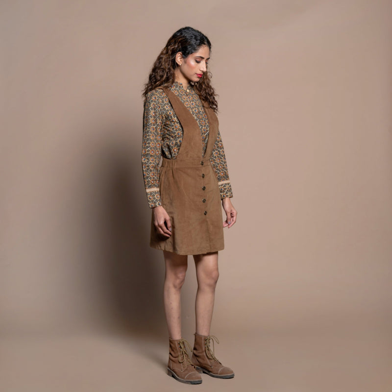 Right View of a Model wearing Camel Brown Cotton Velvet Short Pinafore Dress