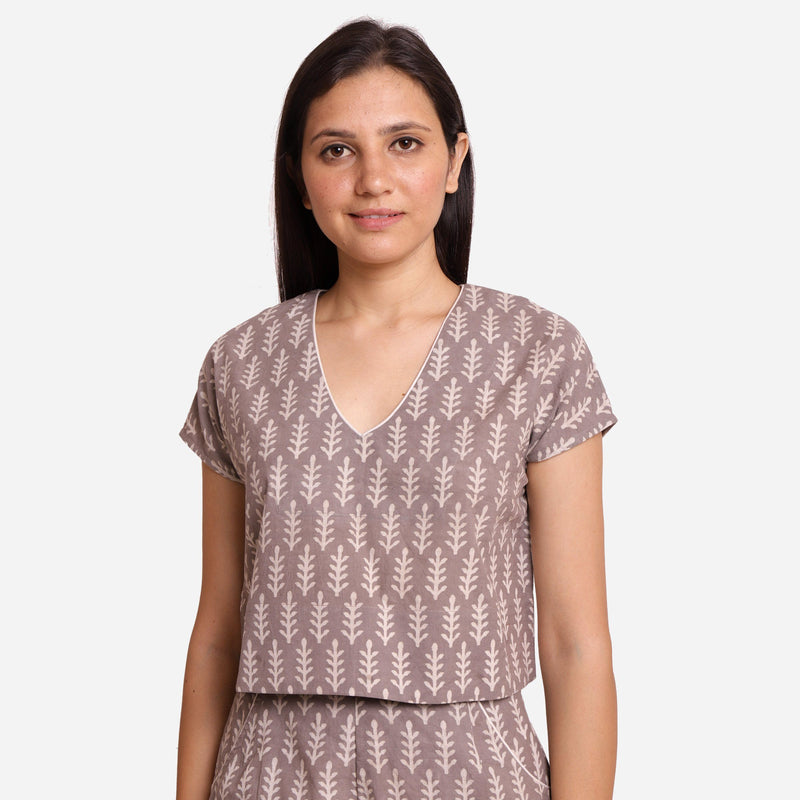 Front View of a Model wearing Grey Dabu Block Print V-Neck Crop Top