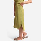 Left Detail of a Model wearing Khaki Green Cotton Flax High-Low Midi Dress