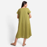Back View of a Model wearing Khaki Green Cotton Flax High-Low Midi Dress