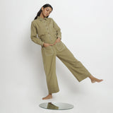 Front View of a Model wearing Khaki Green Vegetable Dyed Handspun Cotton Patch Pocket Wide Legged Pant