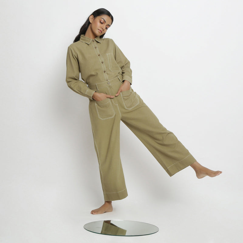 Front View of a Model wearing Khaki Green Vegetable Dyed Handspun Cotton Patch Pocket Wide Legged Pant