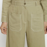 Front Detail of a Model wearing Khaki Green Vegetable Dyed Handspun Cotton Patch Pocket Wide Legged Pant